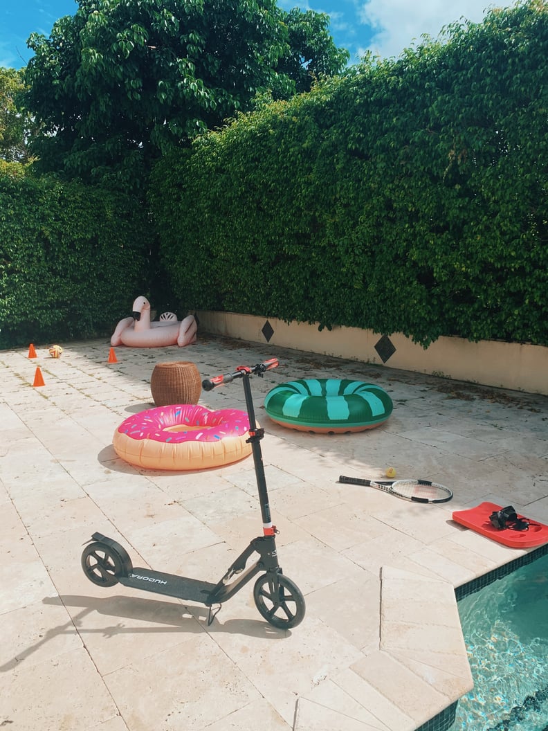 Child playing with backyard obstacle course materials