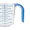 warm water in measuring cup