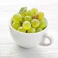 cup of green grapes