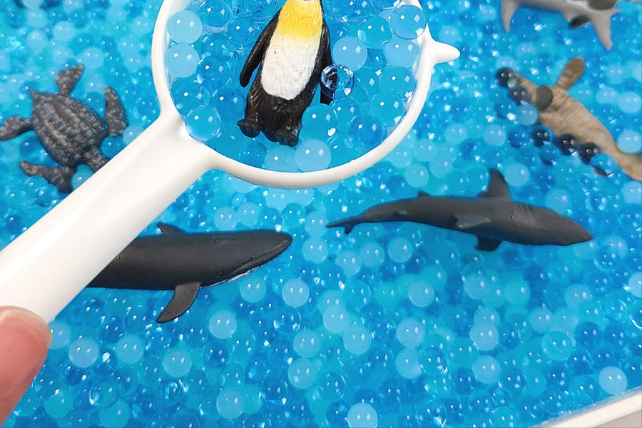 blue water beads for sensory bin