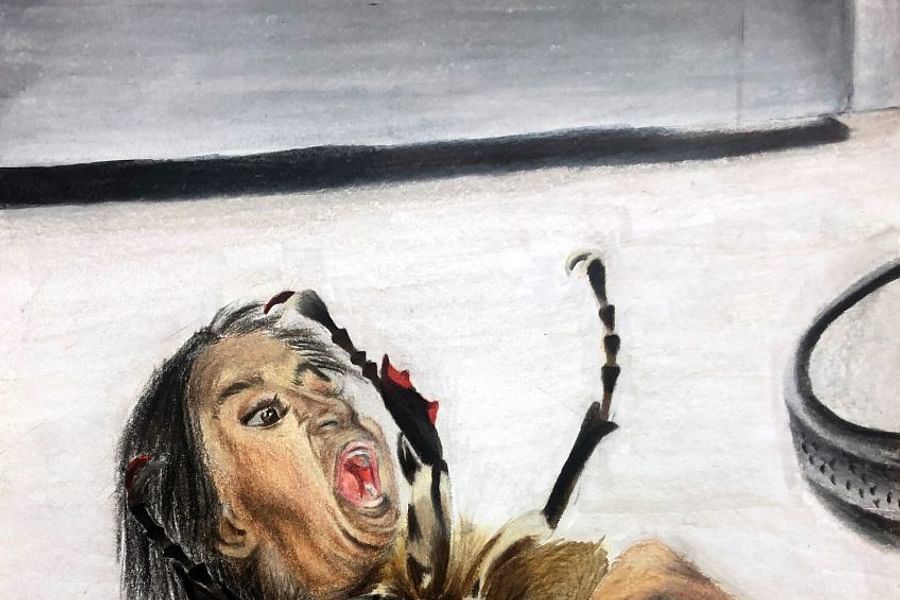 drawing face on bee puppet