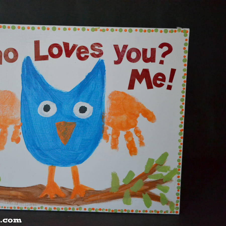 Preschoolers\' handprint love birds craft for Valentine\'s Day