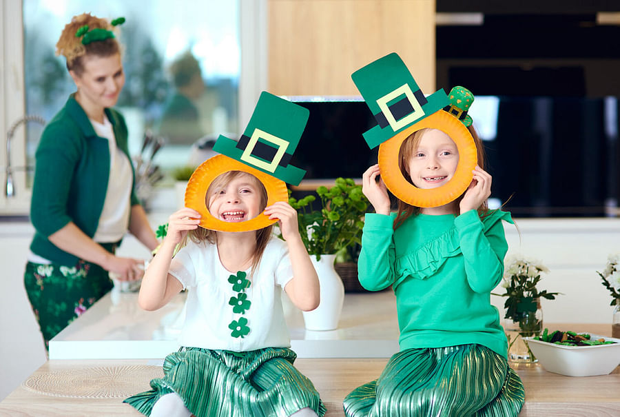 Preschool children dressed in green celebrating St. Patrick\'s Day