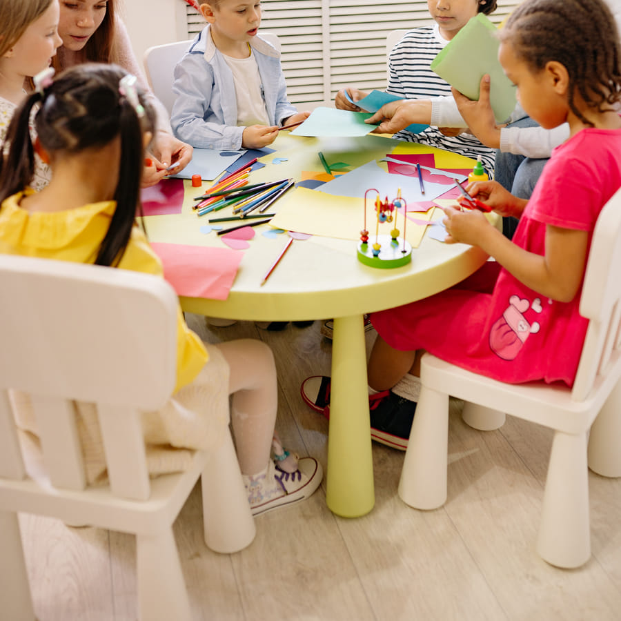 Excited preschoolers joyfully singing a good morning song
