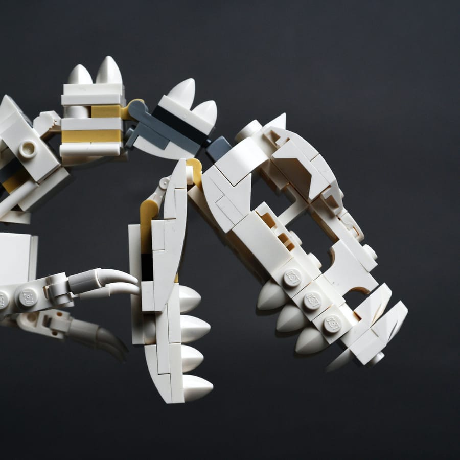 Preschool children joyfully engaging in dinosaur-themed craft activities