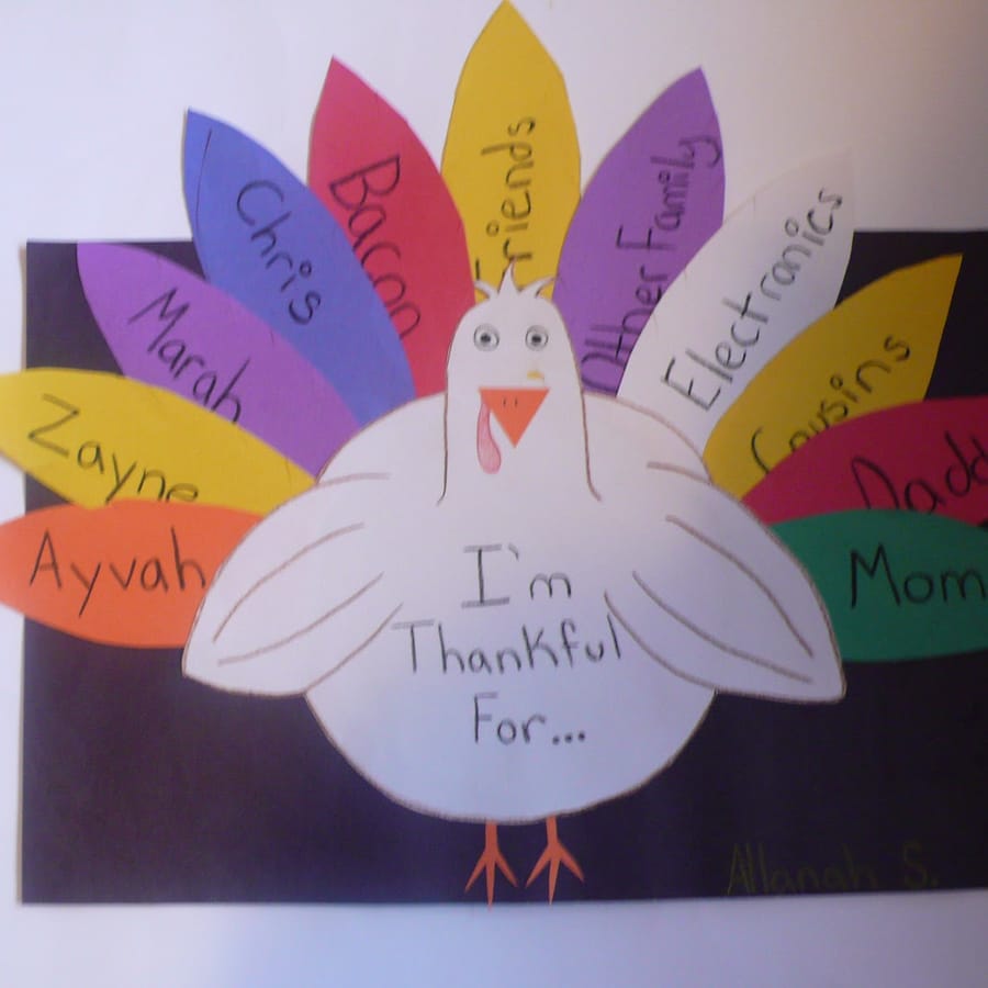 Preschooler\'s completed Gratitude Turkey craft for Thanksgiving